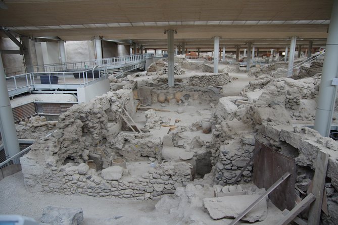 Archaeological Bus Tour to Akrotiri Excavations & Red Beach - Price and value: tour fee plus the Akrotiri entrance