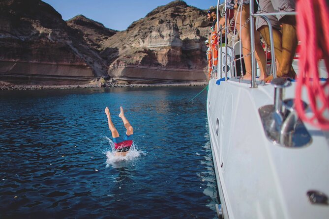 Beautiful Day Catamaran Caldera Cruise incl. Meal & Drinks - Onboard BBQ lunch, open bar, and why the crew details matter