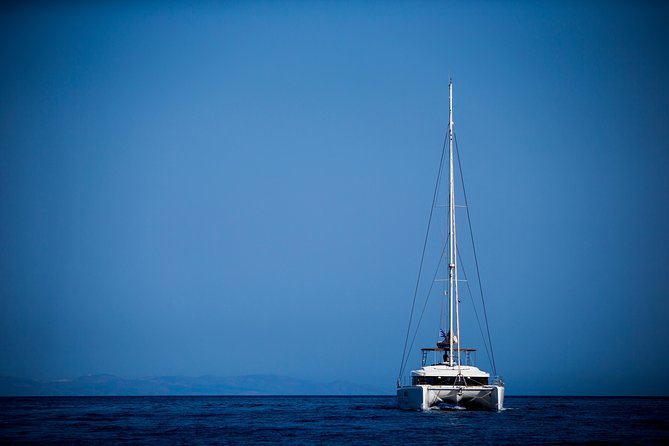 Beautiful Day Catamaran Caldera Cruise incl. Meal & Drinks - Volcano hot springs: the famous swim stop, ticket reality, and safety rules