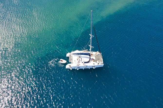 Best of Santorini Private Half-Day Catamaran Cruise with transfer and meal - The onboard meal: lunch or dinner with caldera views