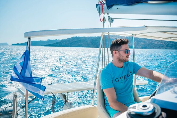 Best of Santorini Private Half-Day Catamaran Cruise with transfer and meal - The crew and the flow of a private charter