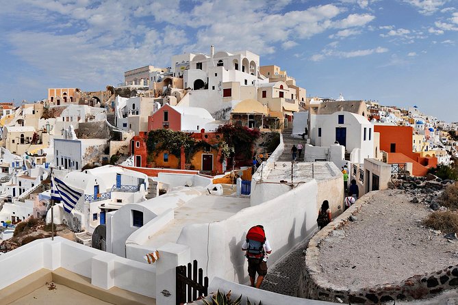 Blue Dome and Oia Sunset Small Group Transfer - Oia Main Street, the Castle Walk, and Finding Your Sunset Angle