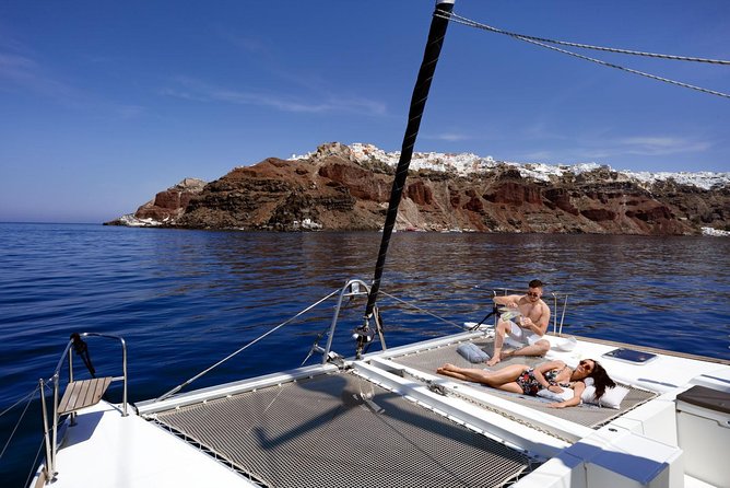 Caldera Cruise with Swim Stops, BBQ on board and drinks! - A Santorini caldera cruise with swim stops is the quick shortcut