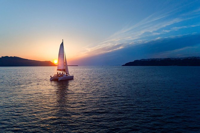Caldera Cruise with Swim Stops, BBQ on board and drinks! - Snorkeling gear included means less packing and more water time