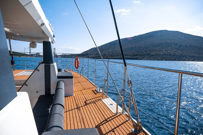 Comfort Max Catamaran Caldera Cruise with BBQ and Drinks - Weather can change your dream stop, especially Red Beach