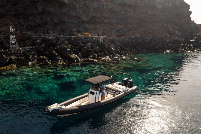 Exclusive cruise experience in Santorini - Stop 3: Palea and Nea Kameni volcano islands, black sand, and hot springs