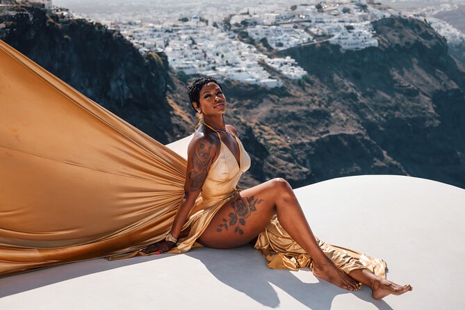 Exclusive Santorini Flying Dress Photoshoot with Pickup - Stop One: Blue Dome Imerovigli, Rooftops, Caldera, and Volcano Views