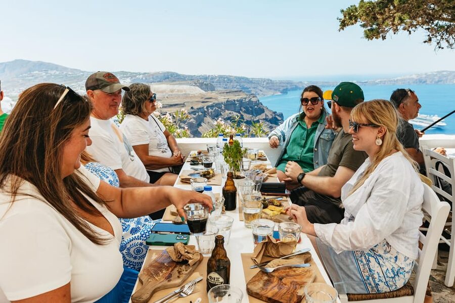 Fira: Guided Foodie Walking Tour with Tastings - Walking the Caldera Edge: Views, Volcano Lines, and Alleyway Stops
