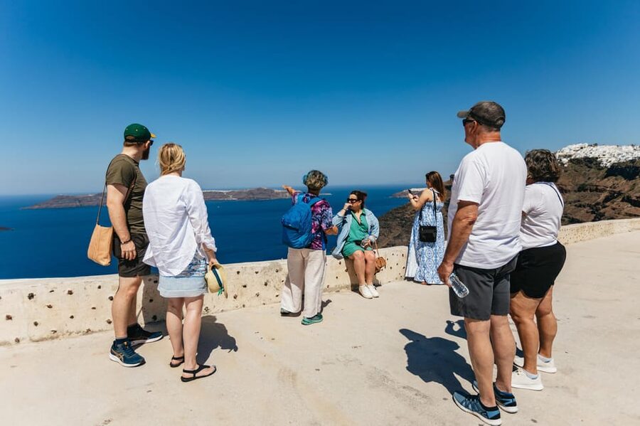 Fira: Guided Foodie Walking Tour with Tastings - Market Time in Fira: Fresh Fish, Fresh Vegetables