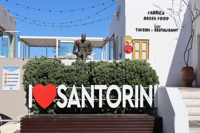 Fira Walking Tour: Explore Top Sights & Hidden Gems - Stop 5: Another look at Saint John the Baptist, plus a contrasting Catholic stop