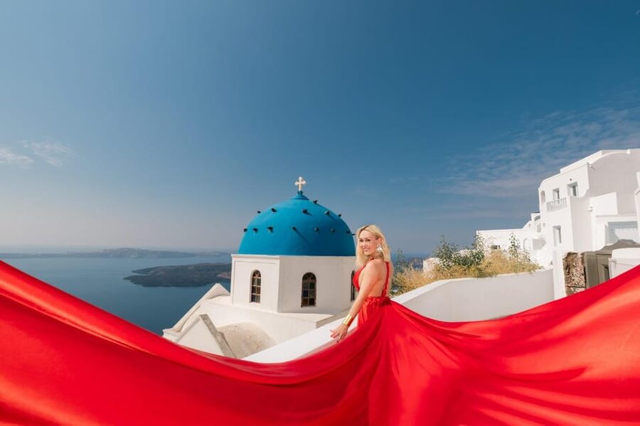 Flying dress Photoshoot in Santorini with Hotel Pickup - Private SUV pickup, then an air-conditioned studio setup