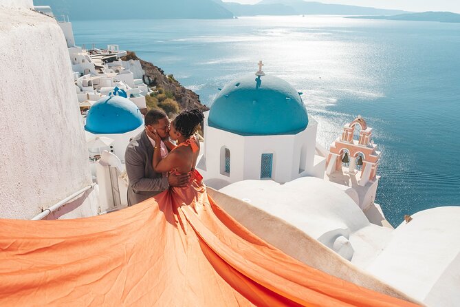 Flying Dress Santorini Photoshoot - Your 1 hour route: Oia streets, Castle views, and Blue Domes moments