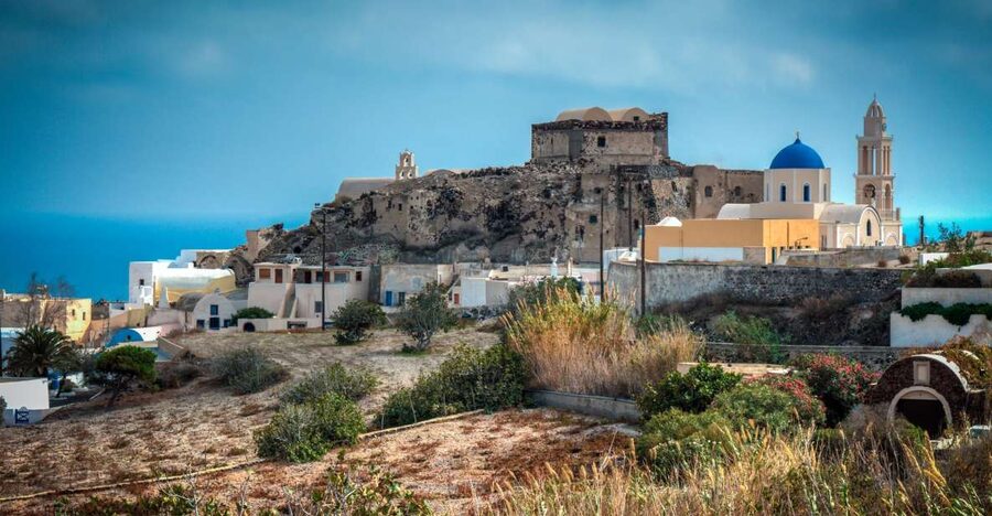 From Oia & Thera: Santorini Villages Guided Tour with Pickup - Black Beach Free Time: Volcanic shoreline, time to walk, and snack flexibility
