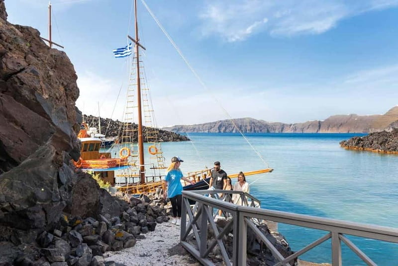From Santorini: Volcano Cruise With Oia Sunset - Comfort, clothing, and small safety stuff that saves you hassle