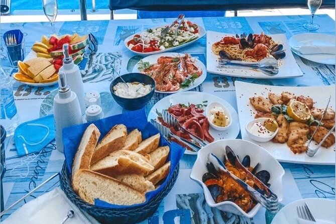 Half-Day Exclusive Catamaran Cruise in Santorini with Meal and Open Bar - Thirassia Island: Snorkeling Time Plus the Onboard BBQ Lunch Moment