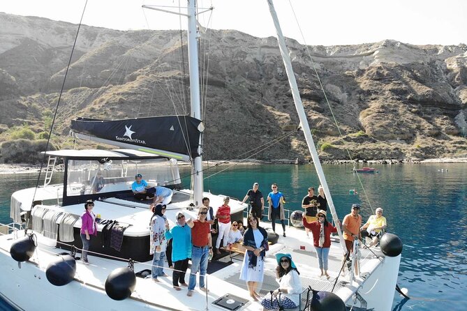 Half-Day Exclusive Catamaran Cruise in Santorini with Meal and Open Bar - Sailing Past White Beach, Mesa Pigadia, and the Venetian Lighthouse
