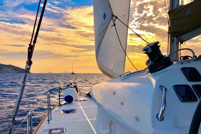 Half Day Premium Catamaran Cruise in Santorini including Oia - Red Beach Swim Stop: Volcanic Color, Quick Water Time