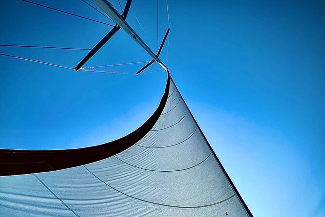 Half day Private Sailing cruise in Santorini island up to 6 pax - Sailing past Akrotiri cape and into the caldera gulf