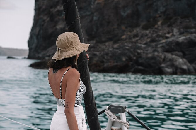 Half-Day Tailor-made Private Catamaran Cruise in Santorini - Akrotiri lighthouse and Old Harbor: see more by stopping less