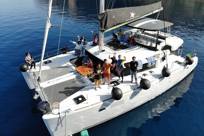 Half-Day Tailor-made Private Catamaran Cruise in Santorini - The crew experience, from Mika to Ellie to the captain