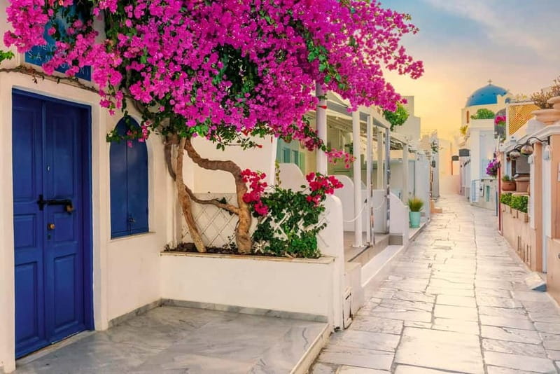 Heraklion: Guided Santorini Day Trip with Ferry Cruise - Fira on the cliff: town lanes, food choices, and photo stops