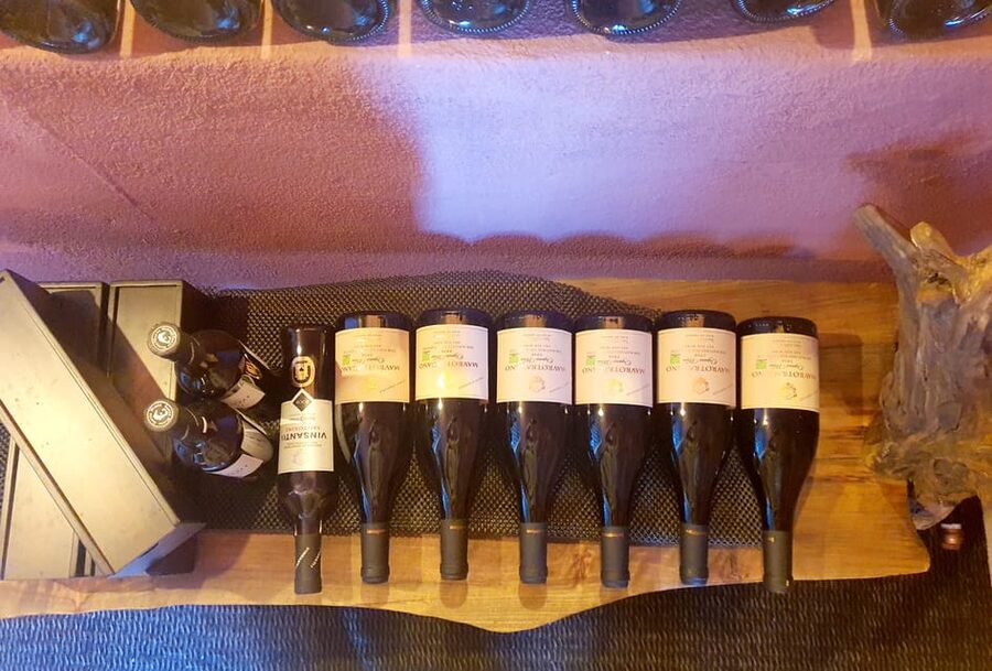 Imerovigli: Premium Wine Tasting with Caldera and Sea Views - The 2 hour flow, vineyard walk to poolside tasting