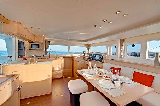 Island Hopping: Santorini Catamaran Charter Cruise with a skipper - The crew factor: skipper and hostess, plus real hospitality