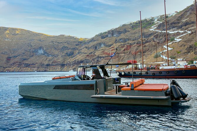 Luxury Private Power Catamaran Tour in Santorini - Santorini Volcano and Nea Kameni: swimming and volcanic formations