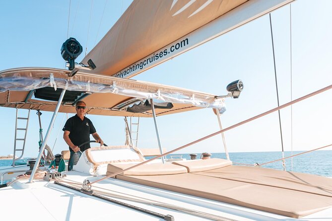 Luxury Santorini Catamaran Cruise: Lunch, BBQ, Drinks, Transfers - Pickup, transfers, and meeting point you should actually plan for
