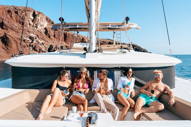 Luxury Santorini Catamaran Cruise: Lunch, BBQ, Drinks, Transfers - The sailing highlights: Red Beach, White Beach, Indian Rocks, Akrotiri Lighthouse