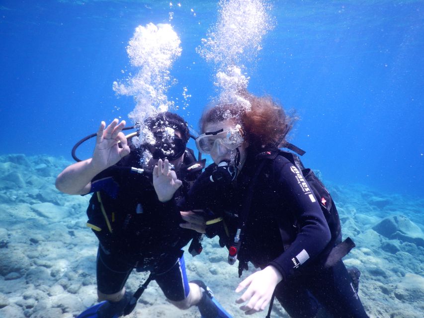 Oia: 2 Guided Scuba Dives off Santorini for Certified Divers - Tank One in the Caldera: Reefs, Cliffs, Wrecks, and Drop-Offs
