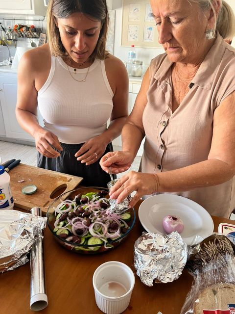 Oia: Greek Cooking Class and Lunch with a Local Grandmother - Hands-on teaching, from chopping to tasting