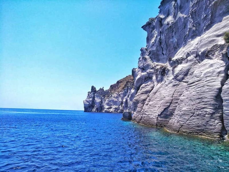 Private, fully customizable cruise in Santorini's caldera - Thira and the volcano of Santorini, seen close enough to understand scale