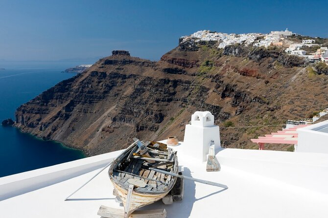 Private Half day - Best of Santorini and Wine Tasting tour - Oia: Blue Domes, caldera views, and alley wandering