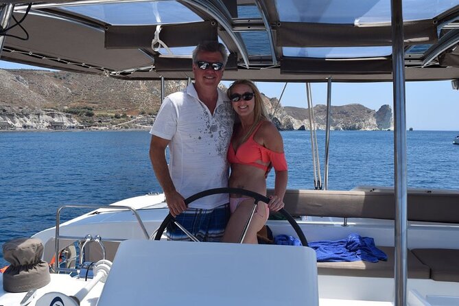Private Luxury Santorini Catamaran Cruise with Port Pickup - Sea conditions and stop changes, a key consideration