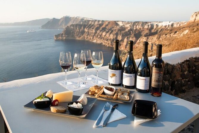 Private Wine Tasting Tour With a Santorini Sunset Ending - Stop 3: Santo Wines sunset finale, cellars tour, and Greek cheese views
