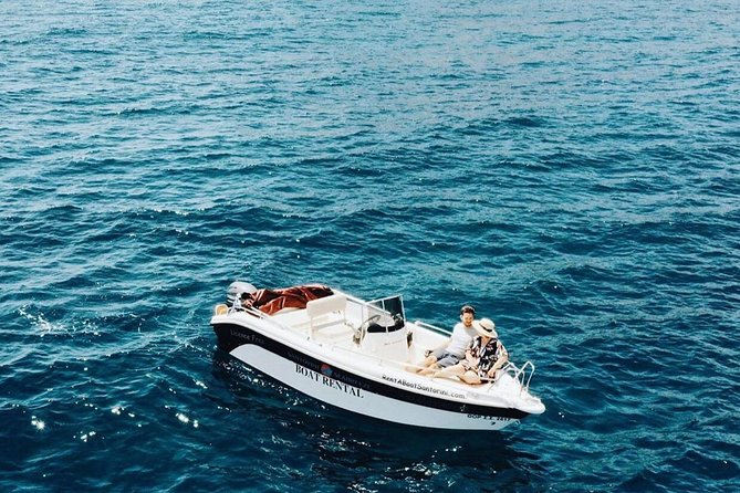 Rent a Boat in Santorini without a License - Caldera views from the water: what swimming stops feel like