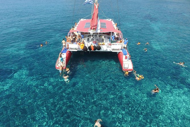 Sailing Catamaran Cruise in Santorini with BBQ, Drinks and Transfer - Hot springs swimming: warm-ish water and a smart approach near the volcano