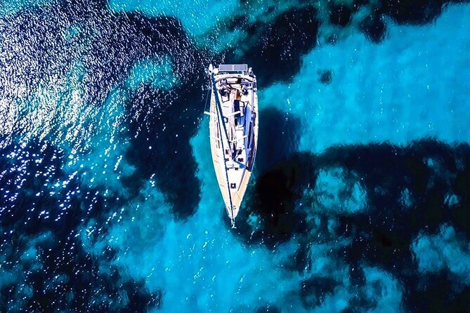Sailsational Luxury Santorini Catamaran Sunset Cruise with Dinner - A sunset catamaran that hits the caldera, not just the coastline