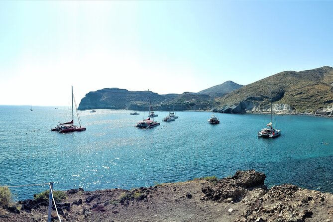 Sailsational Luxury Santorini Catamaran Sunset Cruise with Dinner - Vlychada return: enjoy the last sail, then get driven back