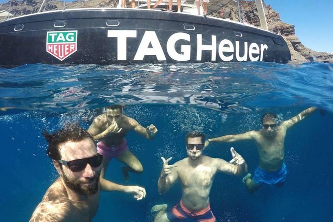Santorini: Adventurous Catamaran Experience with Snorkeling - Catamaran caldera time with snorkeling and hot springs