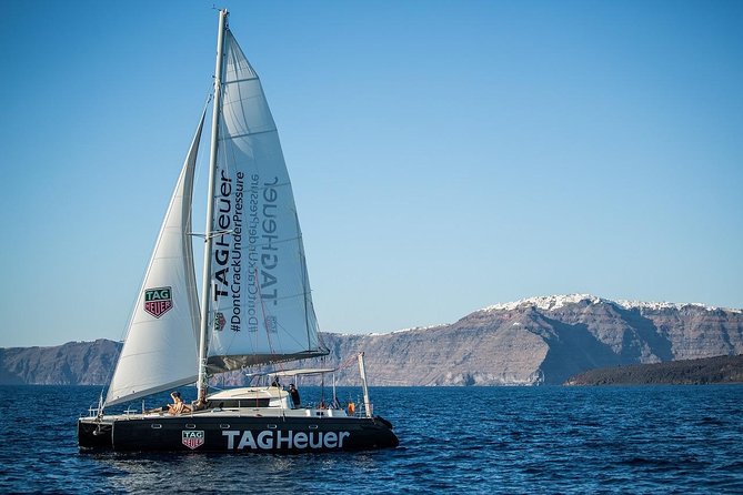 Santorini: Adventurous Catamaran Experience with Snorkeling - Black Mountain snorkeling: clear water and a calm swim plan