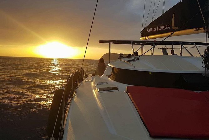 Santorini: Adventurous Catamaran Experience with Snorkeling - Hot springs near the volcano: geothermal swimming in sulphuric coves