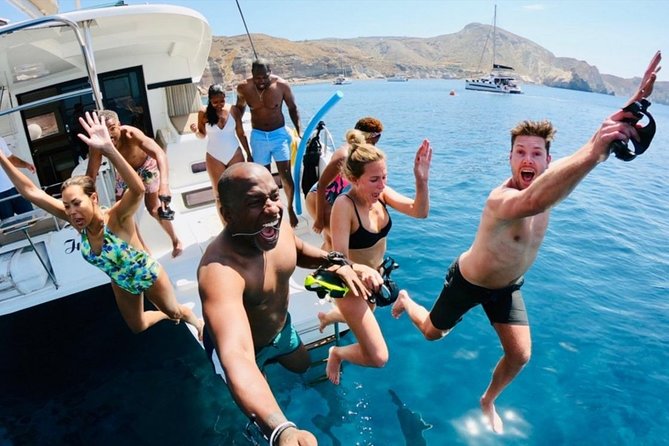 Santorini:All-inclusive Catamaran Cruise with Thirassia Stop - Akrotiri Lighthouse and the swim stops that make the caldera feel real