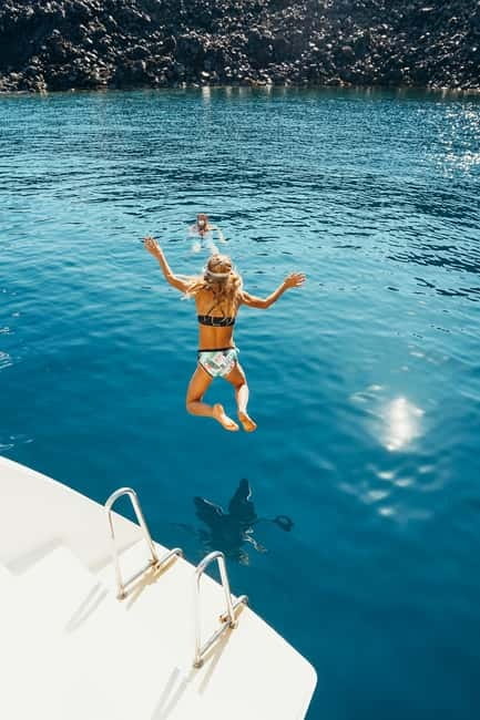Santorini: All-Inclusive Private Catamaran Experience - Sailing Past Red Beach, White Beach, and the Caldera Icons