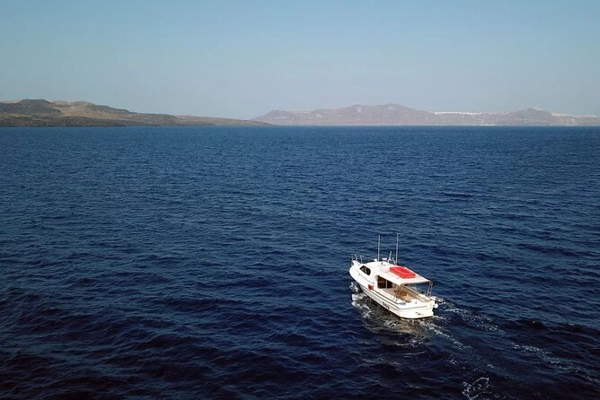 Santorini: Boat tour to Volcano, Hot Springs & Thirasia island - From Fira’s Old Port to Nea Kameni volcano