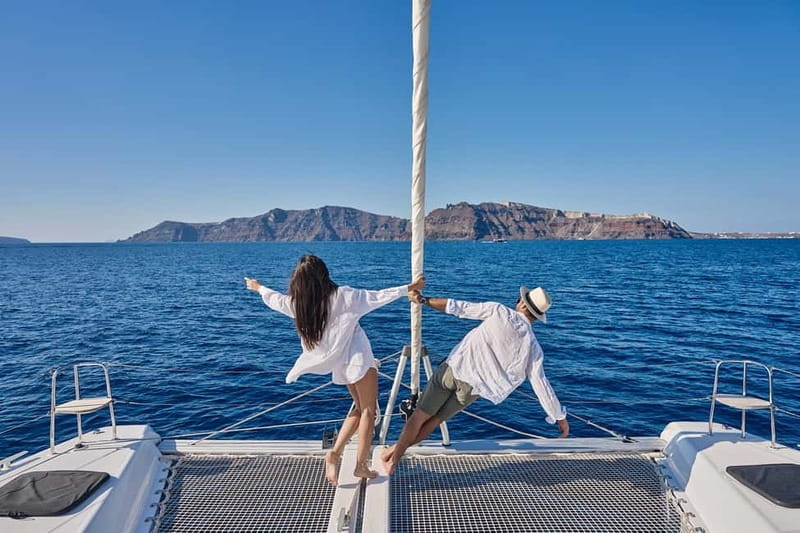 Santorini: Caldera Classic Catamaran Cruise w/ Meal & Drinks - Red Beach by Catamaran: Scarlets, Snacks, and a First Swim