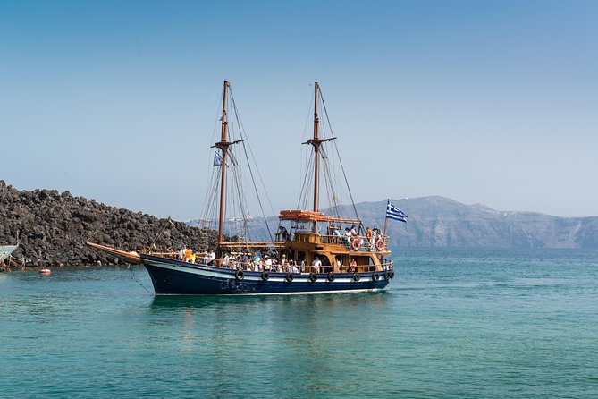 Santorini Caldera Cruise Tour (Volcano, Hot Springs, Thirassia) - On-Board Reality: Foam Noodles, Mini Bar, Restrooms, and Crowds