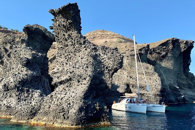 Santorini Caldera Gold Day Cruise with BBQ on board and Open Bar - Getting There: Pickup Timing, Tickets, and the ID Check