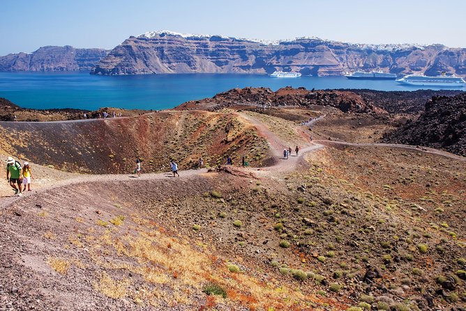 Santorini Caldera Morning Cruise With King Thiras Boat - Sailing back past Oia: the last photo pass matters